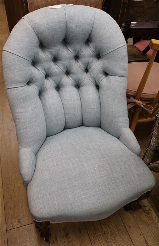 A Victorian rosewood button backed nursing chair